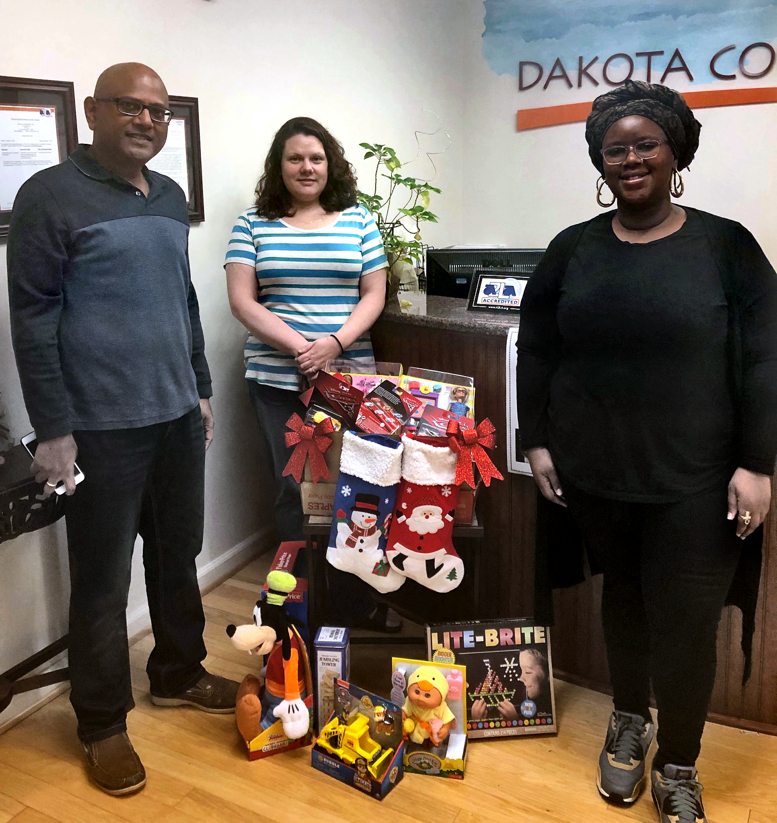 Dakota Employees with collected toys